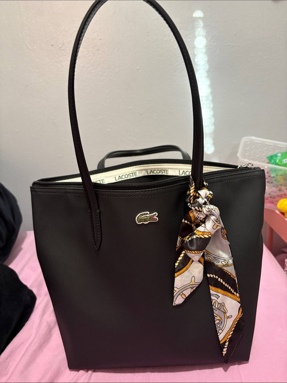 Lacoste Black Tote with Patterned Scarf Accent